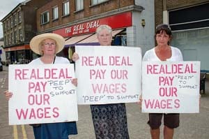 Staff claim victory in wage protest