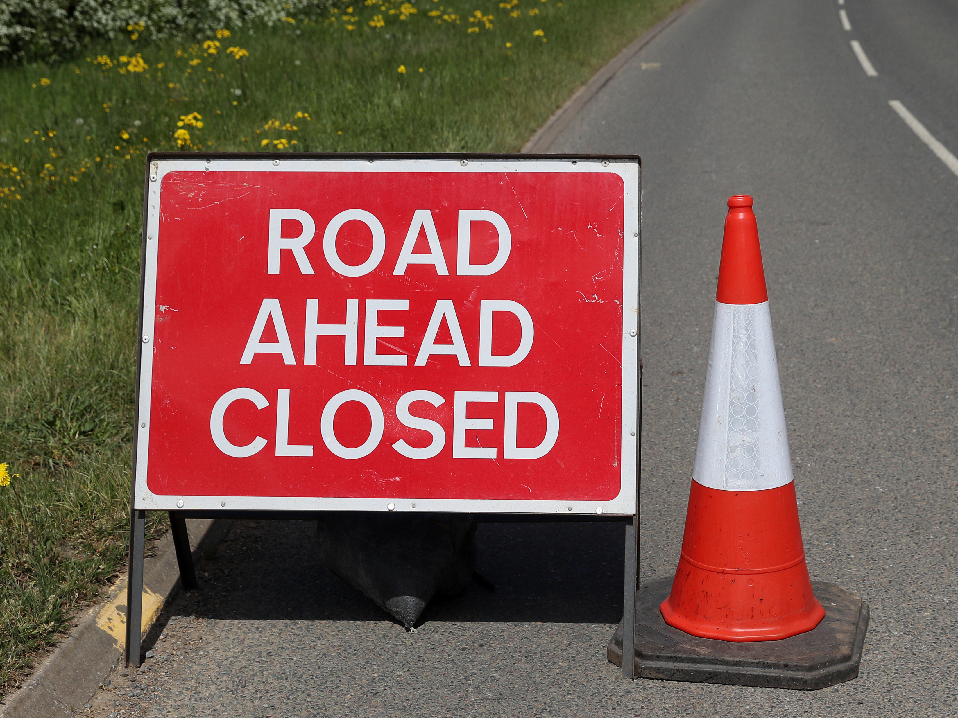 Road Closed signs.