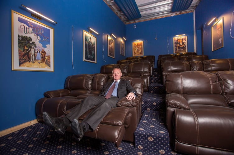 Graham Wildin inside the leisure centre he has built for himself and his family in his back garden (file pic)
