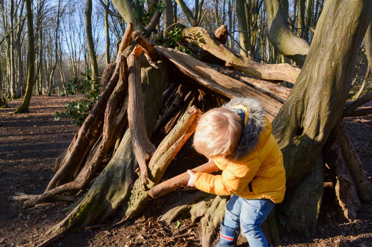 Boy making den