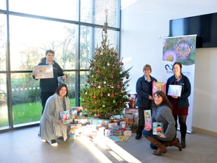 Housing staff and ‘Army’ bring kids Christmas gifts