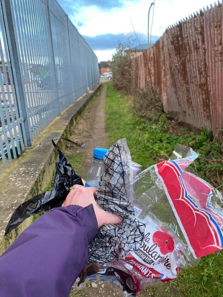 Sandra Brown picking up litter by Morrisons car park