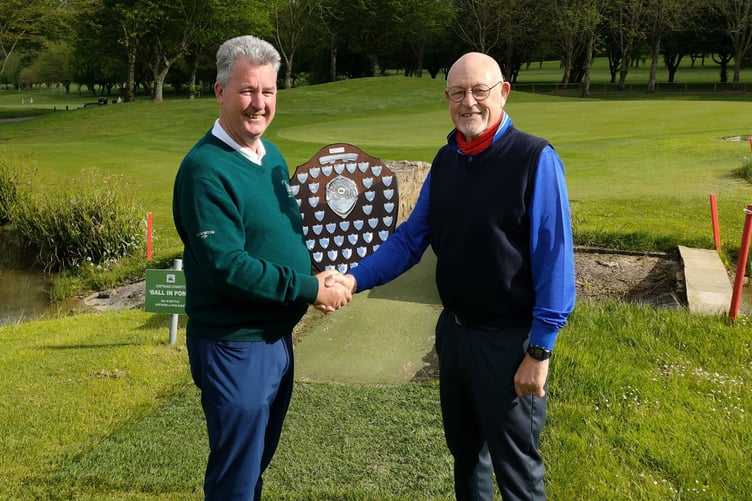 Captain Richard Keeble presents the Captain's Shield to his Vic Captain Alan Bridges