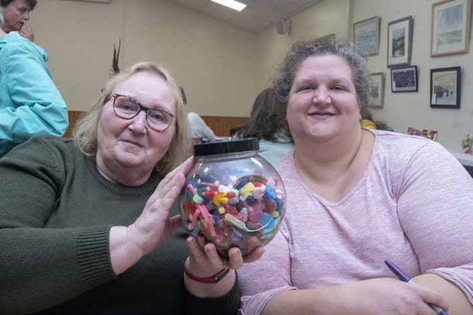 Rose Dale and Charlotte Wiood of Mitcheldean WI invited people to guess how many sweets were in the jar at Mitcheldean fete.