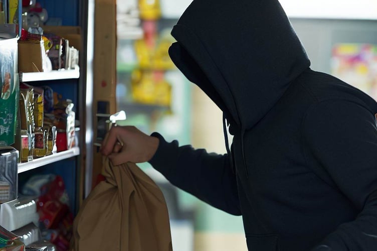 Man stealing from UK corner shop