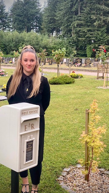 Keisha Williams, Crematorium Assistant with the new post box