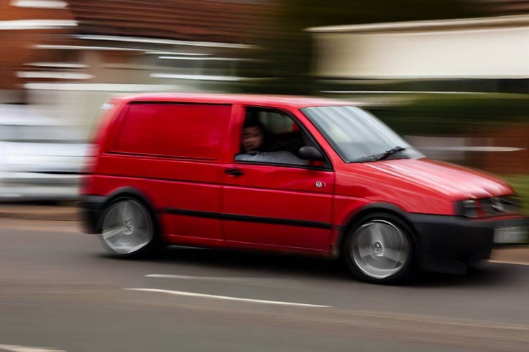 Red caddy speeding
