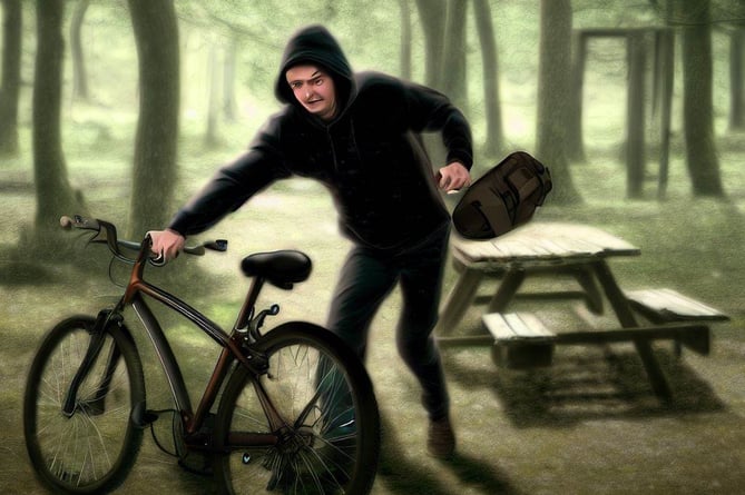 Thief stealing bike