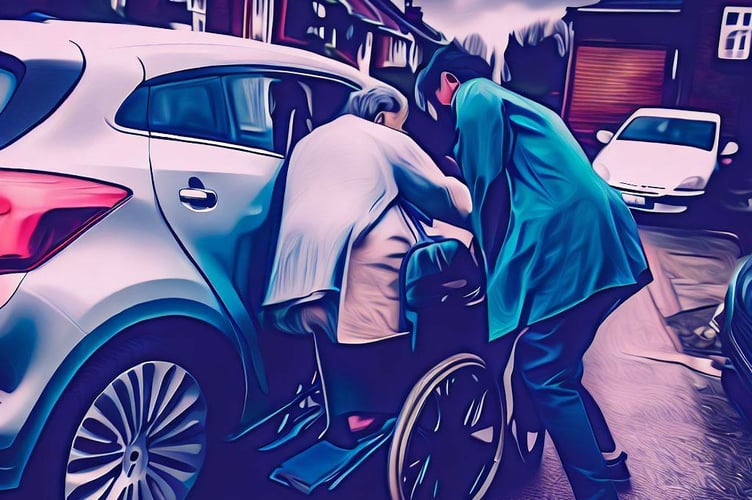 Person helping lady out of car