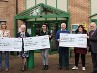 Former Council Chair's chosen charities brave Babet for big cheque