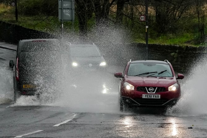 People drive through Henbury Ford, during Storm Gerrit, Bristol, December 27 2023