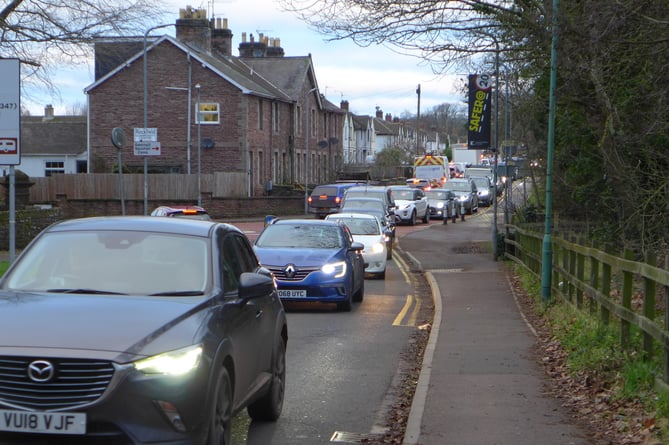 Motorists queuing on Rockfield Road at school rush hour