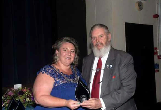 Bill Hobmon is presented with the Mayor's Special Award by Lydney Mayor Cllr Natasha Saunders last summer