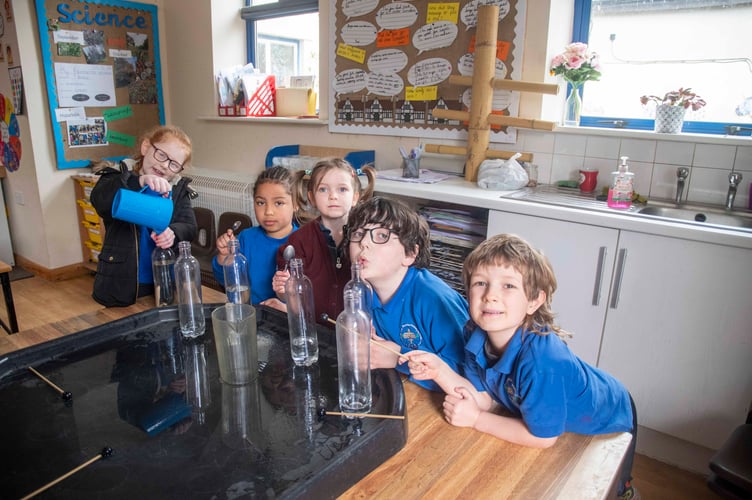 Pupils experimenting with sound