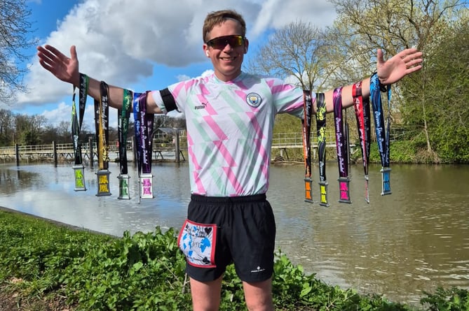 Tom Bell pictured in London at the end of his epic challenge