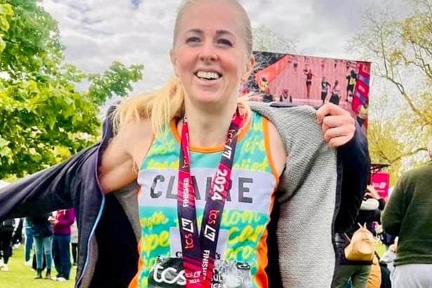 Claire Finley smiles after the miles