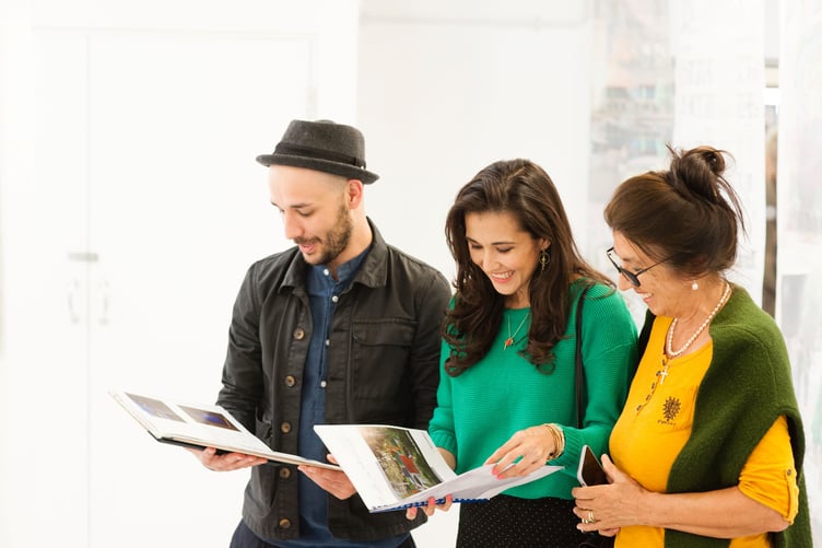 Visitors to a School of Creative Arts Degree Show at University of Gloucestershire