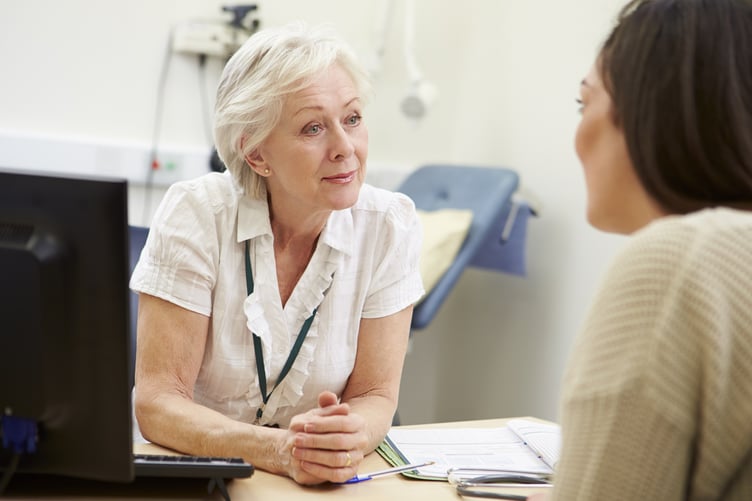 Doctor talking to patient