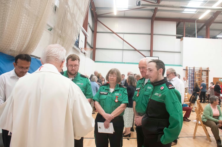 The Archbishop meets first aiders Thomas Cherrett, Dyfri Williams, Janet Williams and Craig Brooks  from Chepstow and Caldicot St John Ambulance who were on duty during the service.