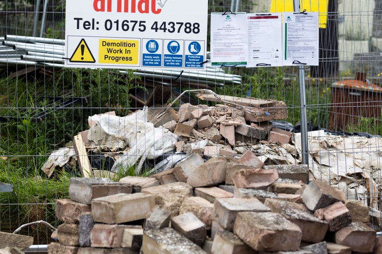 Demolition work has begun on Britain's biggest man cave, 10 years on from when it was constructed without planning permission by Graham Wildin. Cinderford, Gloucestershire. June 04 2024.  The UK's âbiggest man caveâ is finally being torn down after a long running battle over the "eyesore" built more than ten years ago. Millionaire Graham Wildin, 70, has continuously defied court orders to knock down his illegal 10,000sq/ft leisure complex - and has even served jail time over it. The row has been ongoing since 2014 when he built the man cave with a bowling alley, casino and a cinema at the back of his home - without planning permission. Wildin, of Cinderford, Glos, was even locked up for failing to comply with a court order to decommission the building and has lost a string of other court cases.
