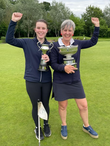 Sophie Price, left, and Nadia Stirling with their county trophies