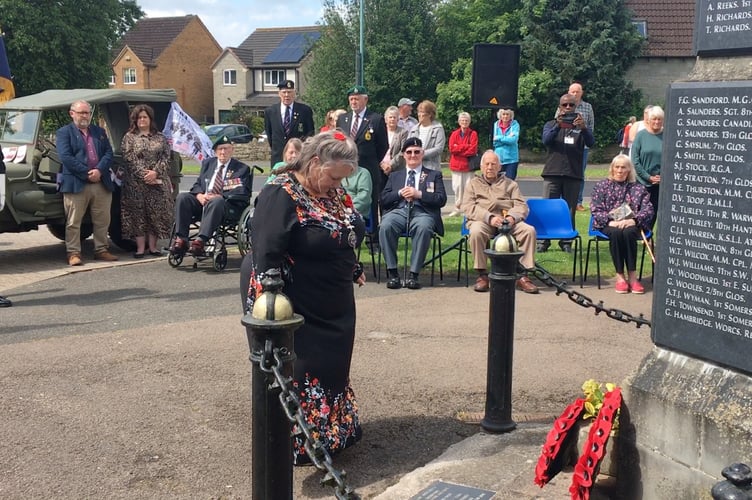 The Mayor of Lydney, Cllr Tasha Saunders, lays a wreath at the town's war memorial.