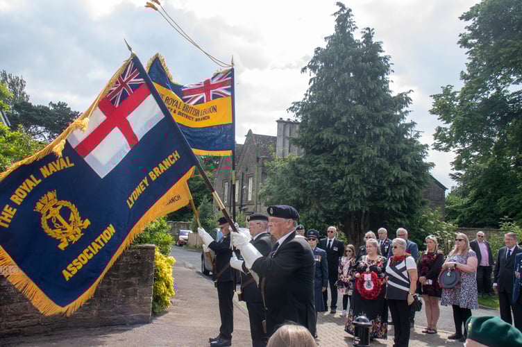 Standards are raised after Last Post at Lydney.