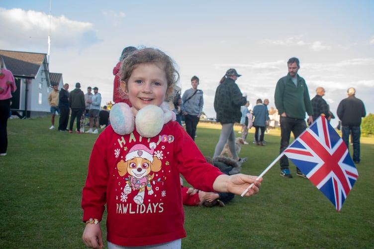 Katie Kiss-Jones waves the flag at Ruardean.