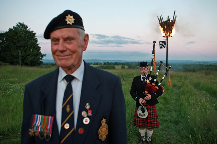Les Meadows , who lit the beacon at Blaisdon, and piper Rhys Thompson.