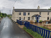 Two vehicle crash leaves motorcyclist in hospital