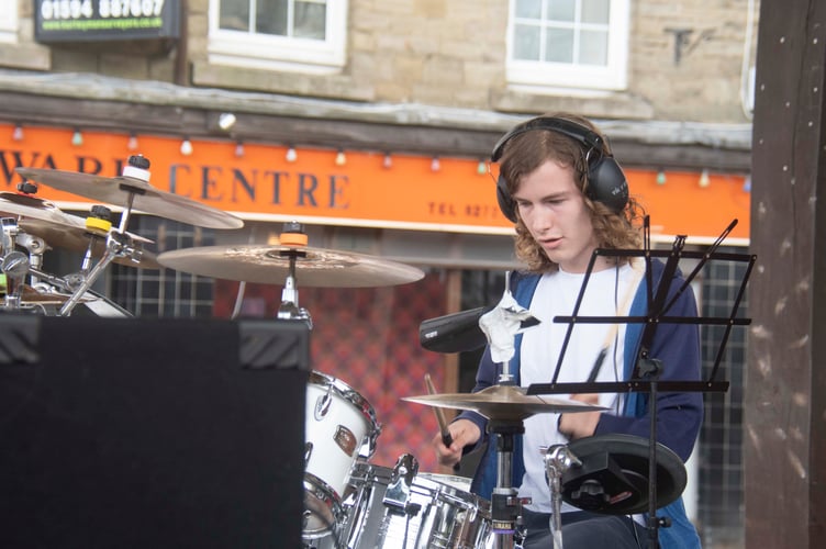 Cub Wragg-Jones playing Insane in the Rain by the group of the same name.