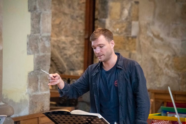 Conductor Thomas Payne.
