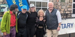 Rotarian charity walk cash to be handed over