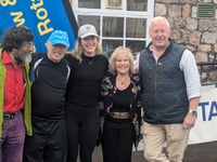 Rotarian charity walk cash to be handed over