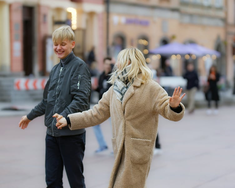 Couple dancing in the street