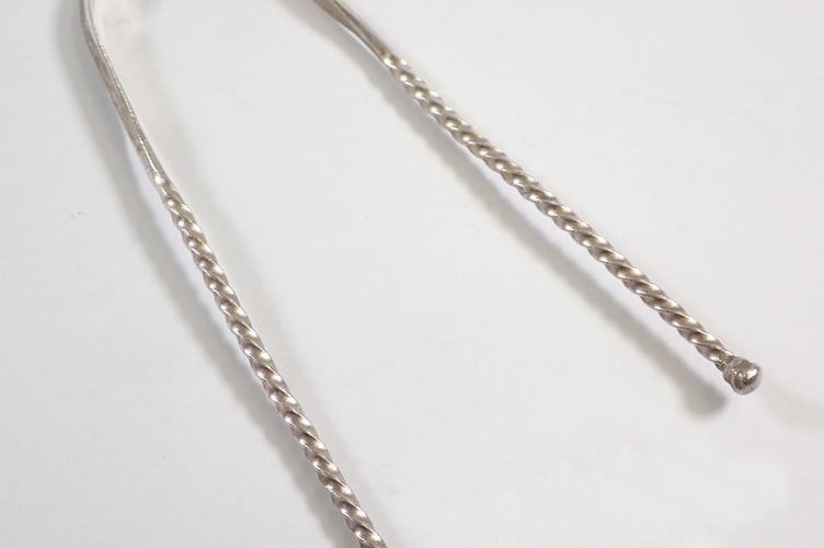A Georgian silver tongue scraper
