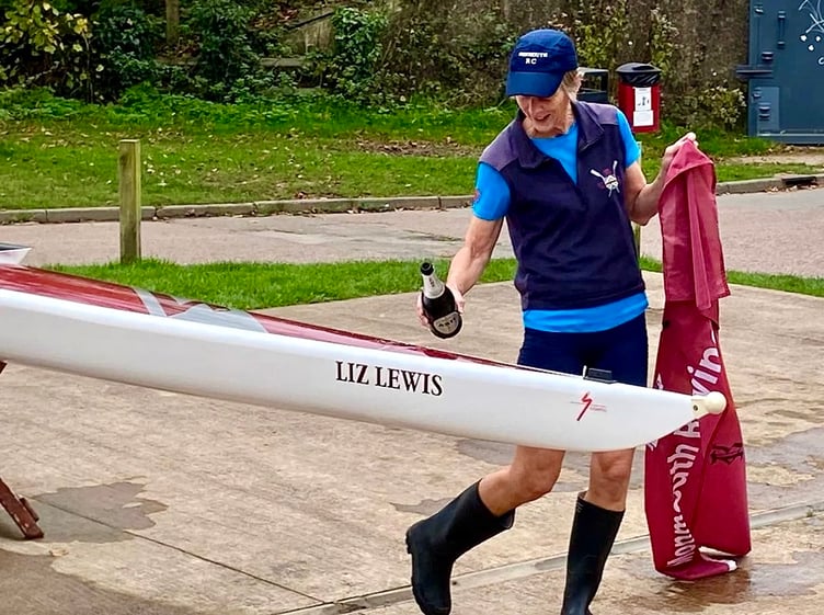 Liz Lewis christens the boat named after her