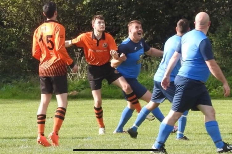 Josh Tippins (in orange) suffered a major injury in a game last month.