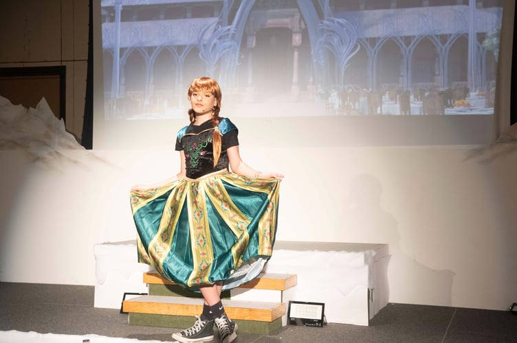 Taylor Edwards as Princess Anna.