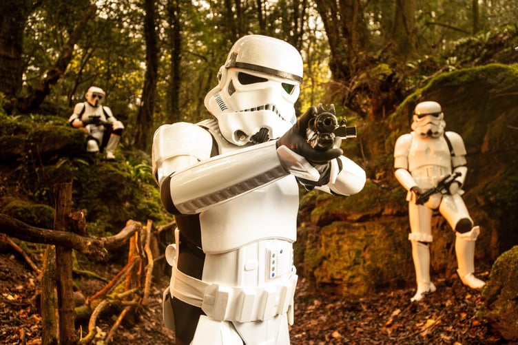 FILE PHOTO - Star Wars characters promote 'Star Wars: Episode VII The Force Awakens' in the Forest of Dean. Photo released December 12 2024. Researchers have begun studying the environmental impacts of Star Wars location shooting - over fears it disrupted a famous woodland.Puzzlewood, in the Forest of Dean, was an important filming location for Star Wars 'The Force Awakens' in 2014.If you were one of the many Star Wars fans who caught sight of the film crews descending on the Forest of Deanâs ancient Puzzlewood for iconic then an Open University research academic wants to hear from you.Dr Rebecca Harrison works in the OUâs Film and Media department and is conducting a study called the âEnvironmental Impact of Filmmaking (EIF)â using Star Wars, its film props and locations as the theme.