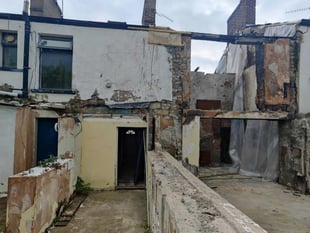 Repair green light for explosion-hit house