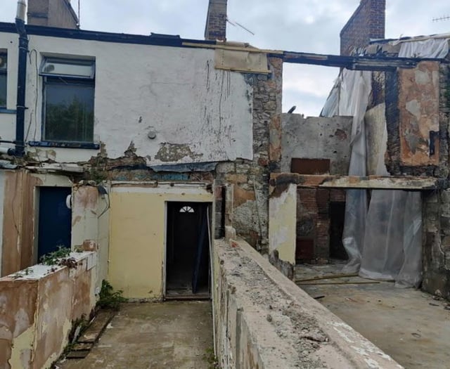 Repair green light for explosion-hit house