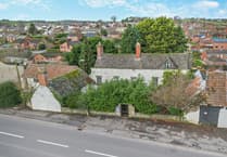 Period home for sale is “timeless piece of history” with its own bar