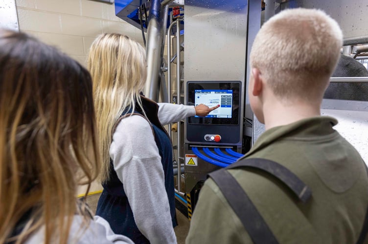 Students with the new milking system at Hartpury