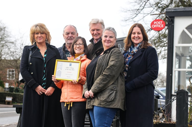 GRCC’s Gloucestershire Village of the Year 2025 competition is launched with the help of representatives of the last winning village, Dymock, the overall winner in 2014, outside the village’s Beauchamp Arms Community Pub and Shop. Pictured left to right are Barbara Piranty, GRCC CEO, Charles Coats, GRCC Chair of Trustees, Debbie Downham, Jeremy Downham, Cllr Gill Kilmurray, and Parish Clerk Rachel Freestone.