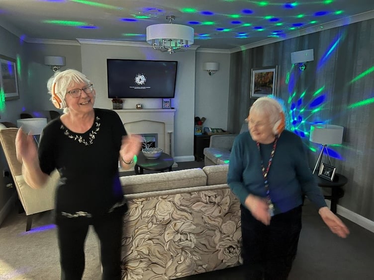 Shirley and Pam enjoying a dance together