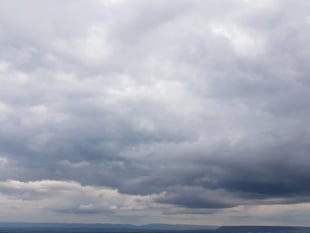 Partly cloudy today with a gentle breeze and patchy rain tomorrow