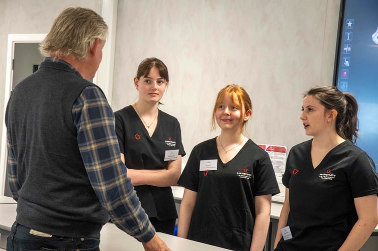 Hannah Crooks, Abi Evans and Hannah Stone with digital dissection equipment.; 