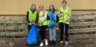 Rugby girls' fundraising boosted by litter pick
