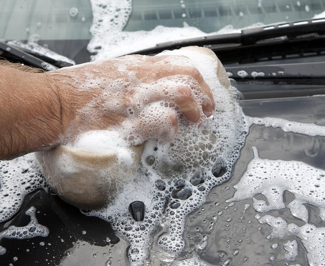Funeral directors' charity car wash for hospice